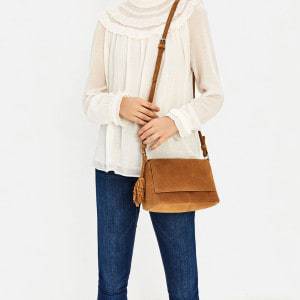 Real Suede Cross Body From Zara Holds Everything While Your Hands Are Occupied With Stick or Wheel