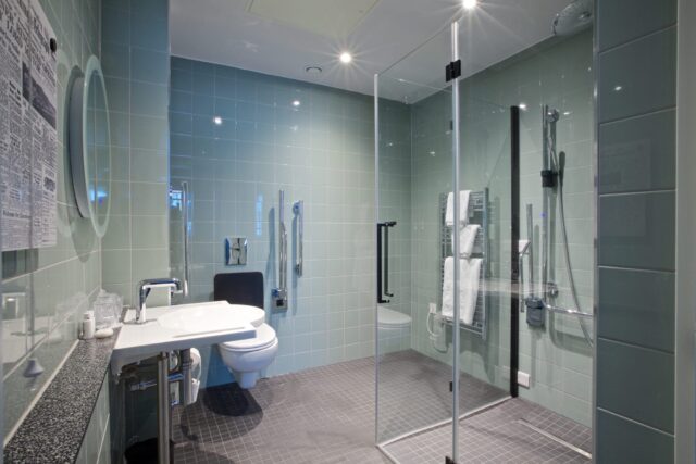 Accessible BAthroom at The Telegraph Hotel Coventry. Walk In Shower & Grab Rails Around the Toilet