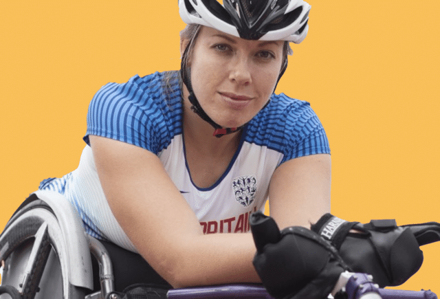 woman on bike with helmet wearing blue and white t shirt